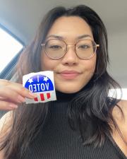 Curry headshot with "i voted" sticker