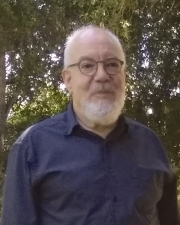 Picture of Professor David Smith in front of trees